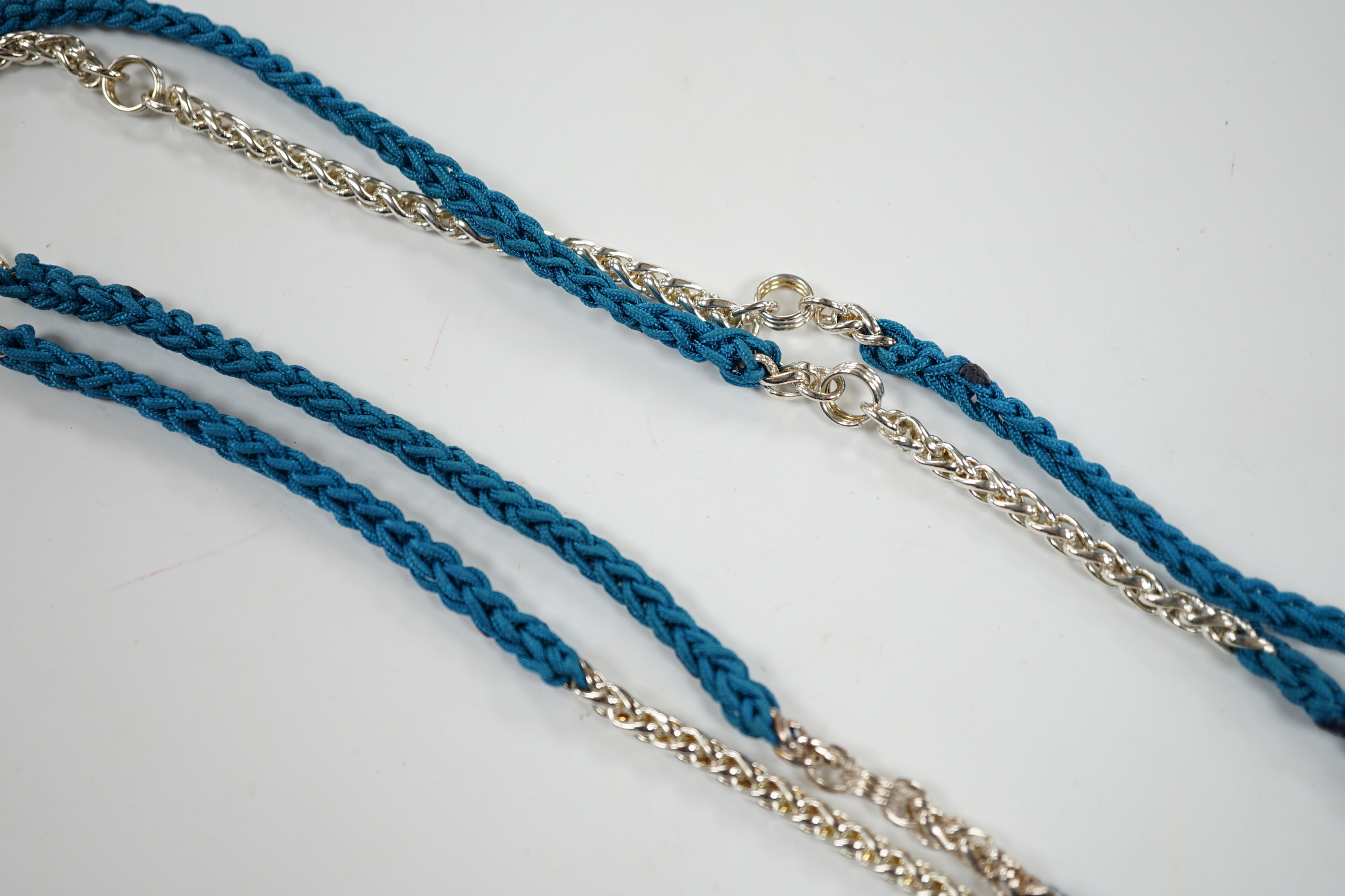 A modern Links of London, silver skull and heart pendant, 14mm, on a Links of London, silver link and rope twist thread chain, 90cm, in a Links of London box.